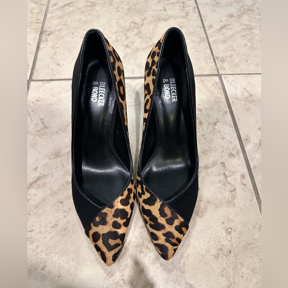 Leopand/ Black colored heels